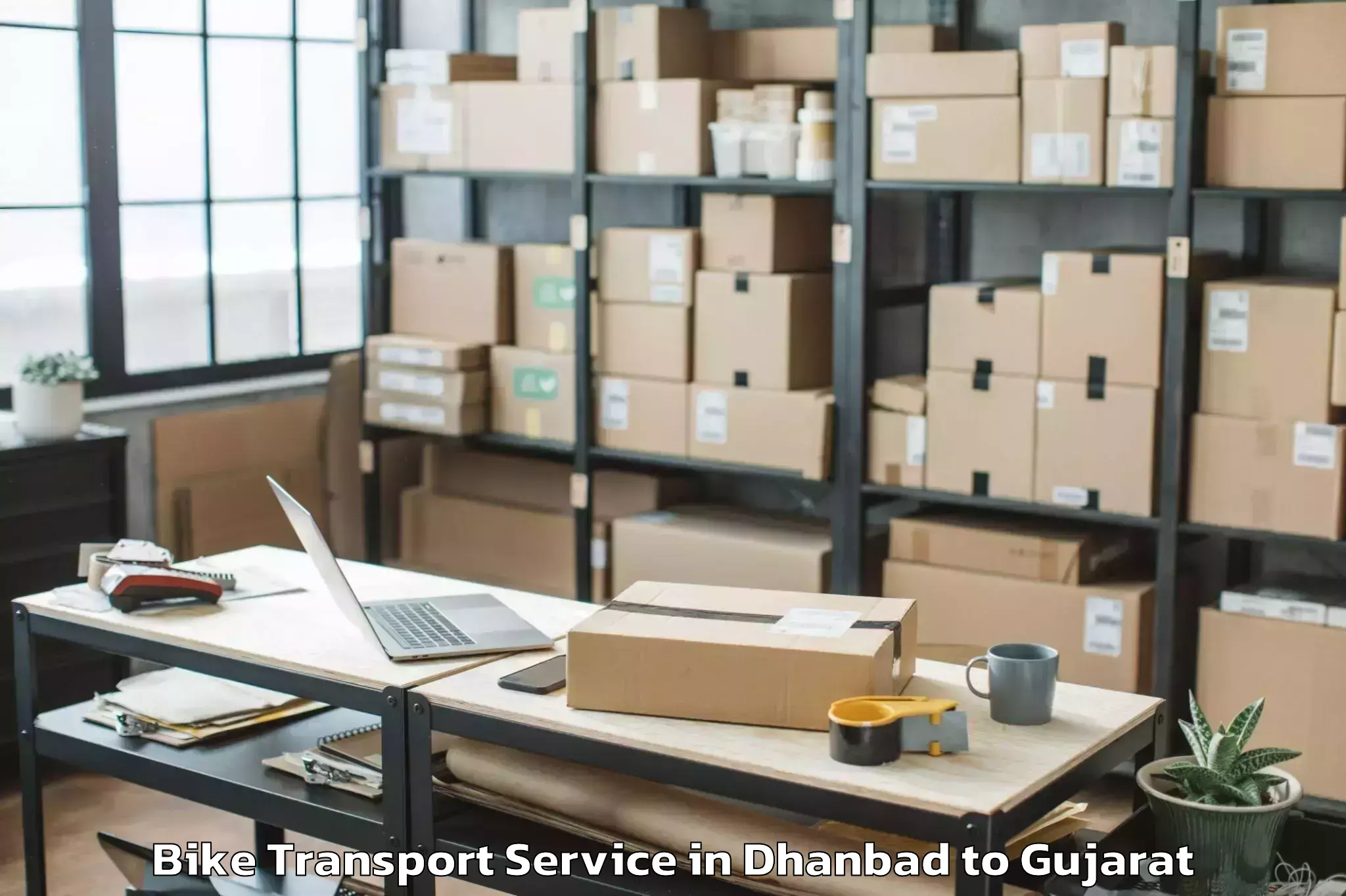 Hassle-Free Dhanbad to Gujarat University Ahmedabad Bike Transport